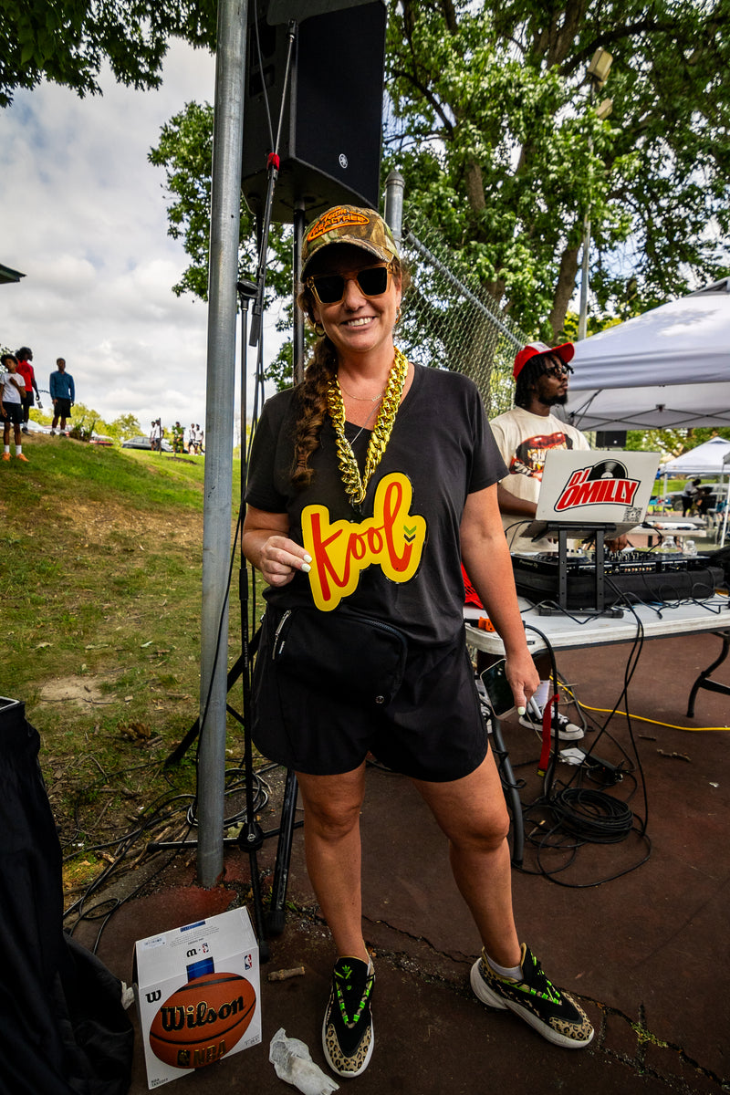 lady wears kool chain by basketball