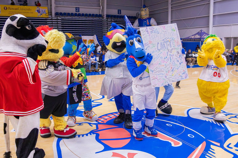 kooli with mascot friends celebrating coatys 7th birthday at chase fieldhouse in wilmington delaware
