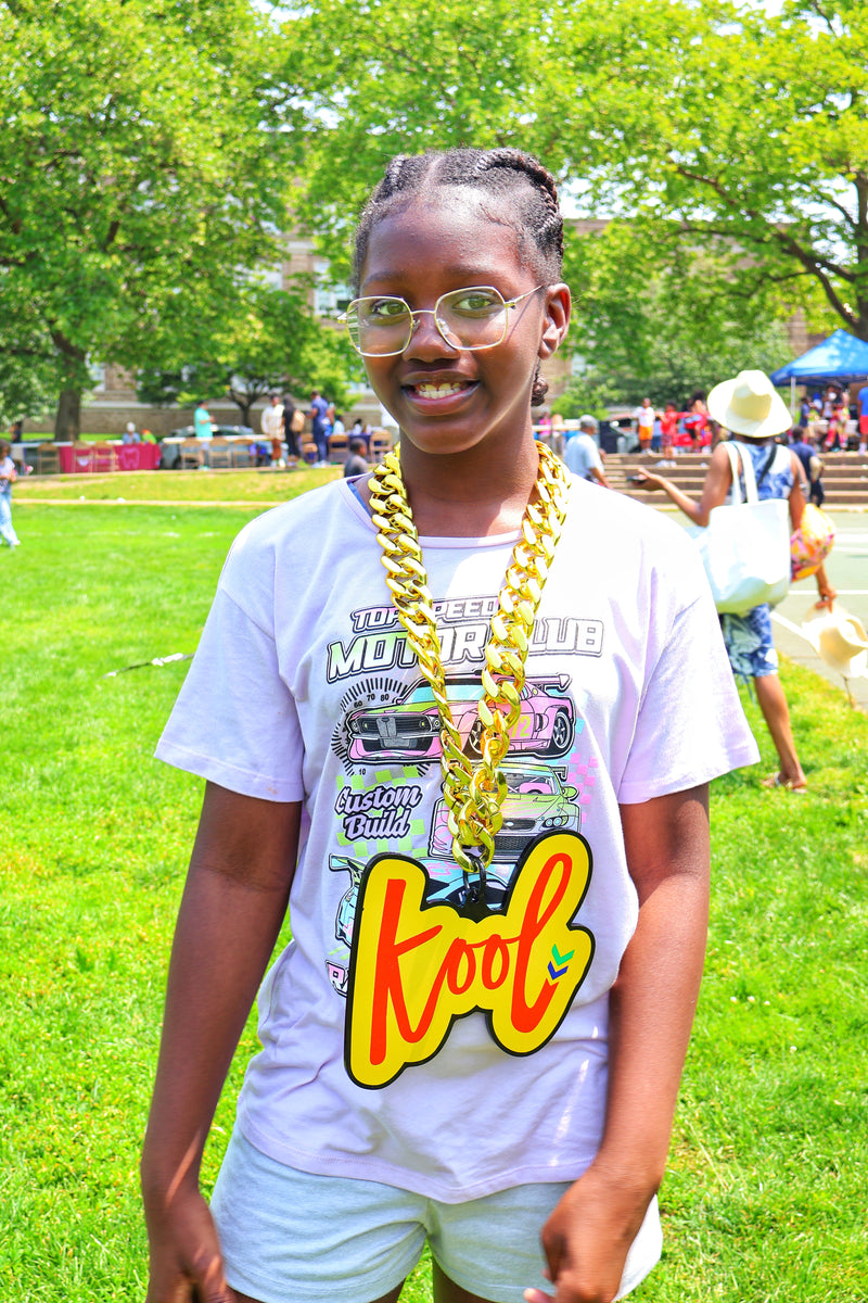 girl with glasses wears kool chain