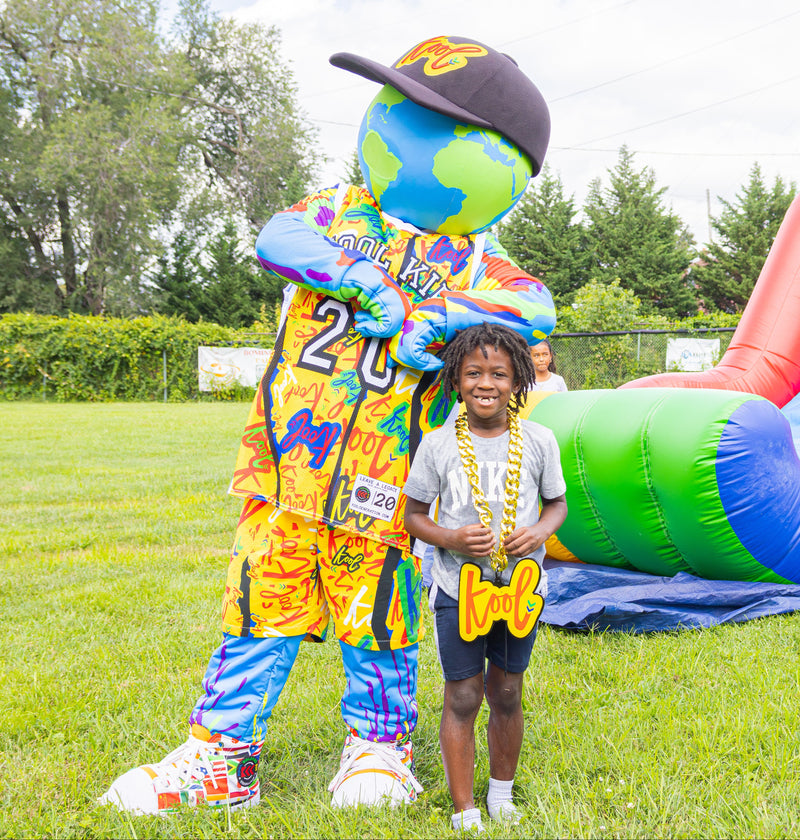 black kid wears kooli chain with kooli