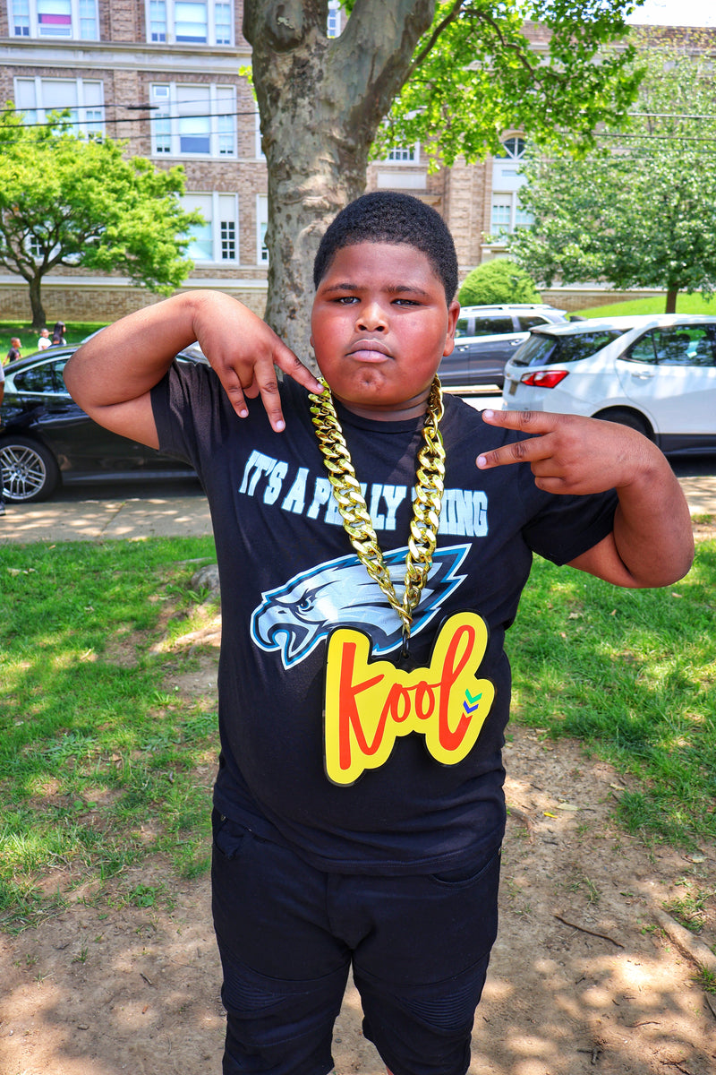 kid wearing kool chain