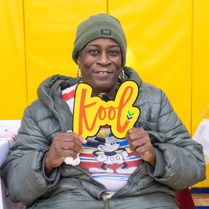 lady wears kool chain at community event