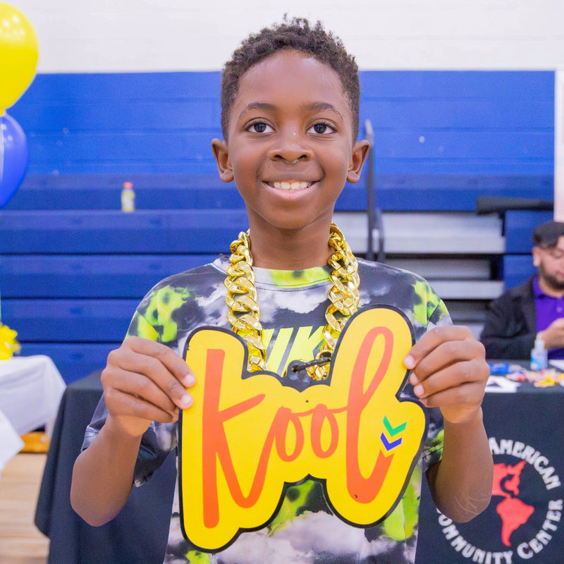 kool black kid wearing kool chain