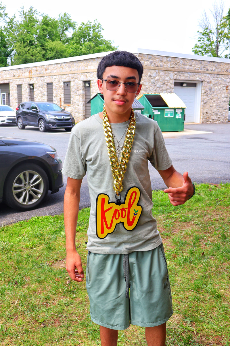 kid wearing kool chain
