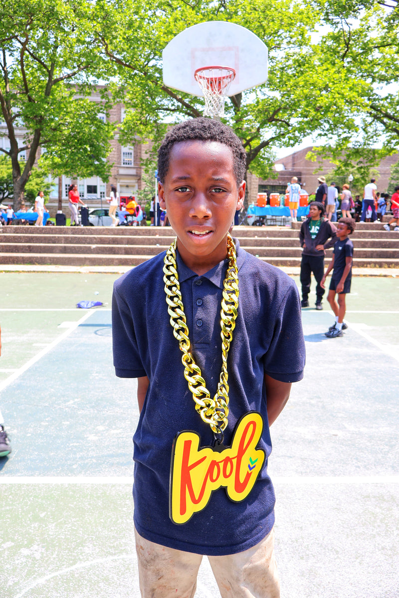 kool stares at camera with kool chain