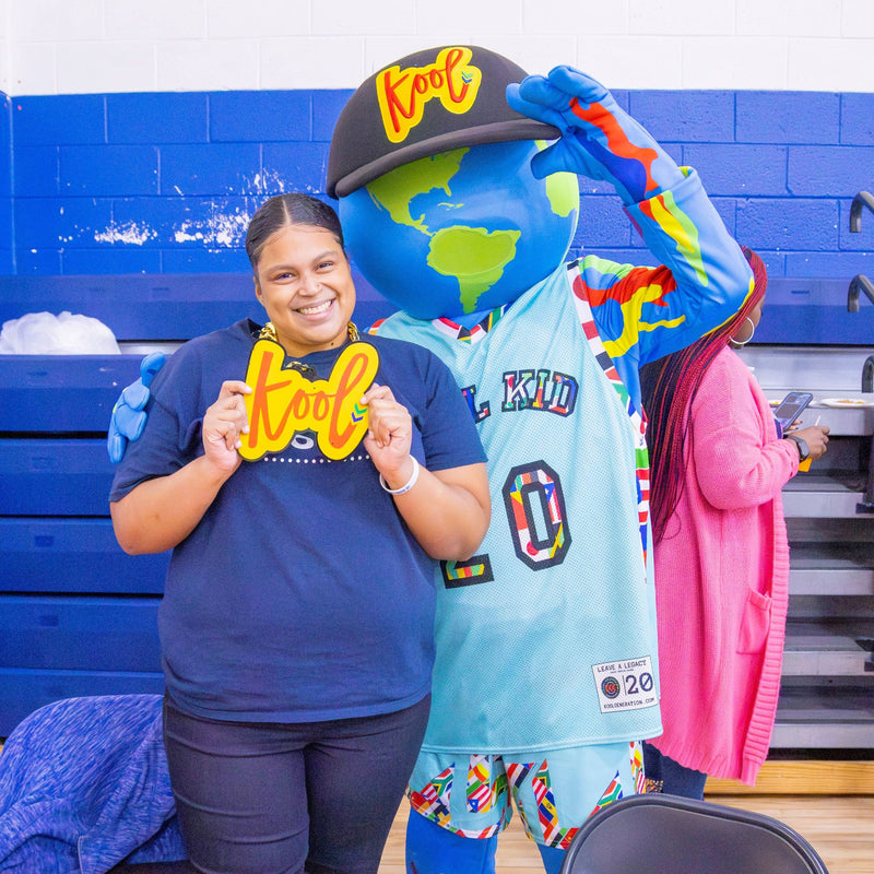 kooli hanging with event attendee wearing kool chain