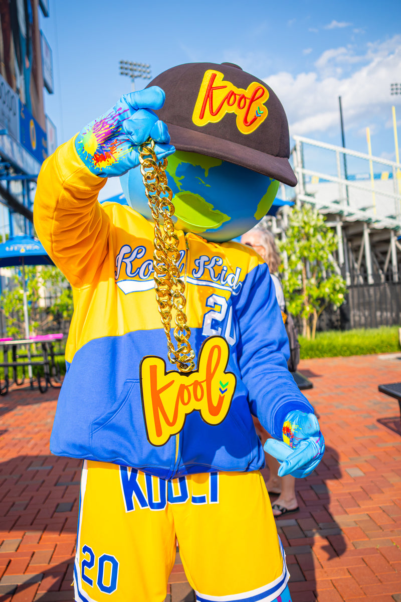 kooli holding the kool chain