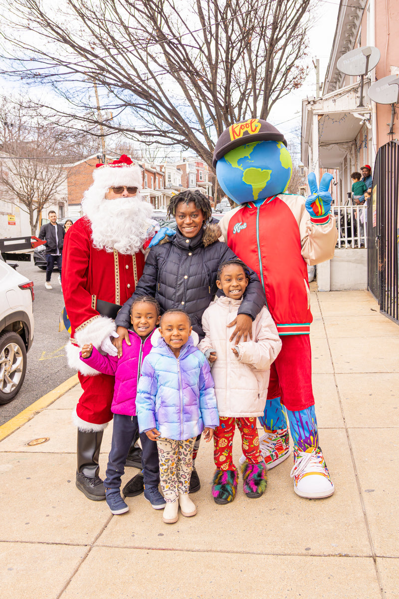 kooli with santa at christmas blessings at latin american community center
