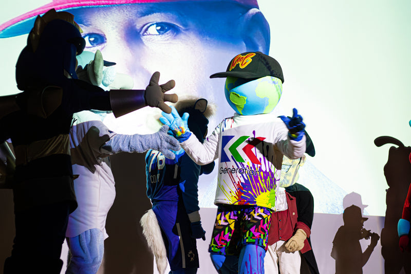 kooli greeted by mascots at 100 pairs to give x3