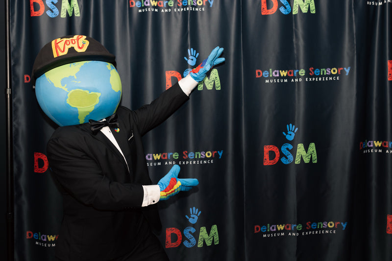 kooli on black carpet at delaware sensory gala