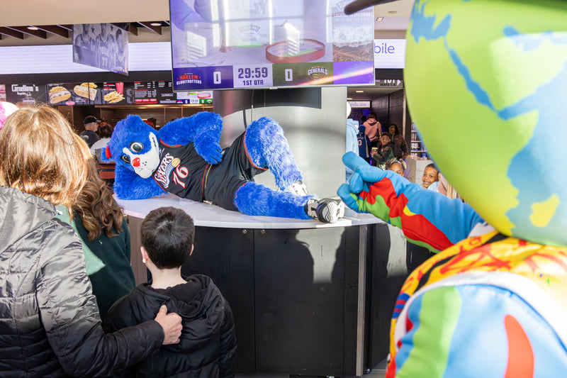 franklin sixers mascot jokes with kids as kooli points
