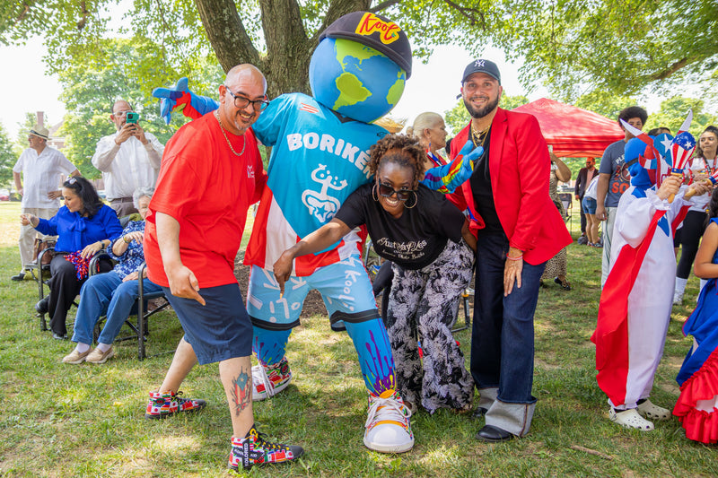 kooli posing with attendees and having fun