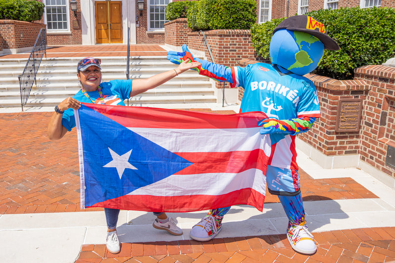 kooli take picture with pr flag