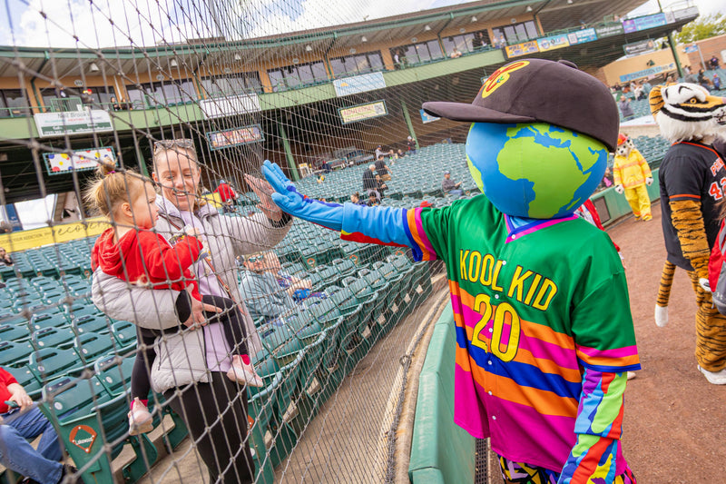 kooli blueclaws  sports event, interacting with a child and adult.