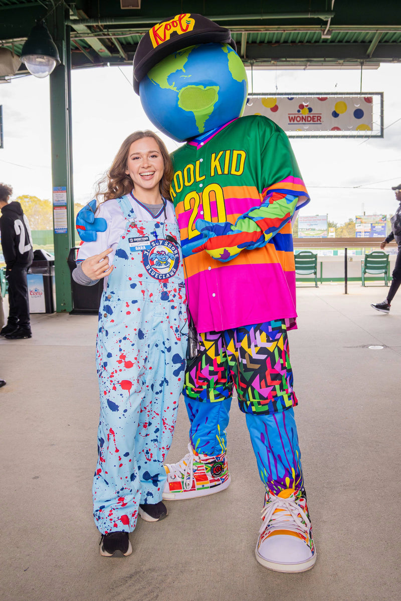 sara standing next to a kooli at busters birthday