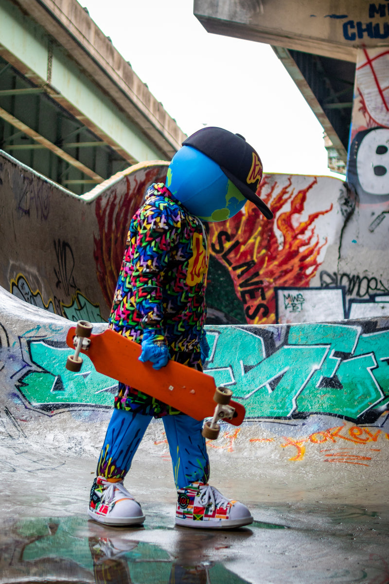 kooli walks with skateboard