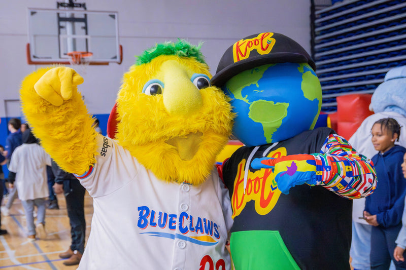 kooli snaps a photo with blueclaws mascot at coatys birthday
