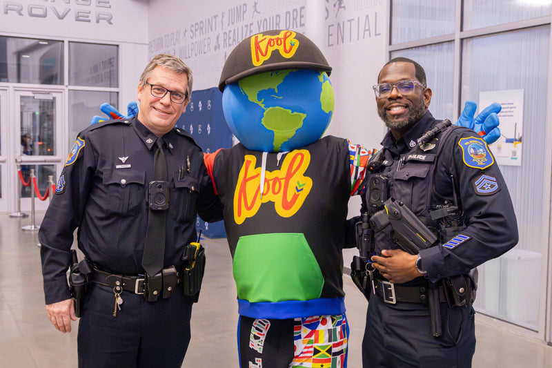 kooli grabs a photo with wilmington police at blue coats game