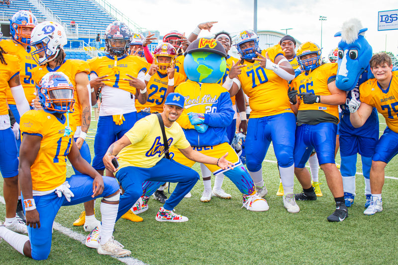 kooli posing with gold team at university of delaware