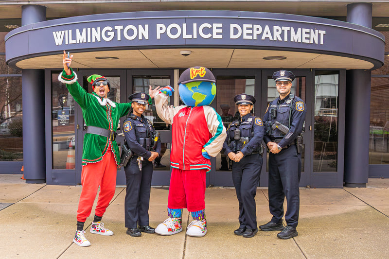kooli posing with wilmington police and randall law