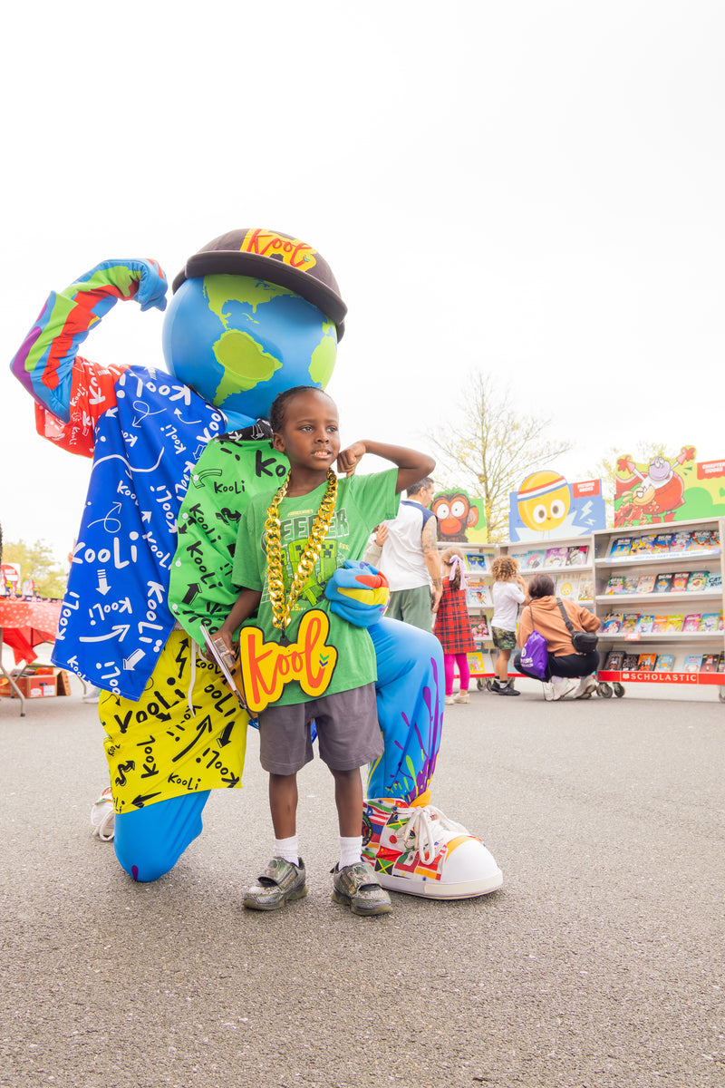 kooli and young boy strike a pose at the healthy ids day event in wilmington delaware