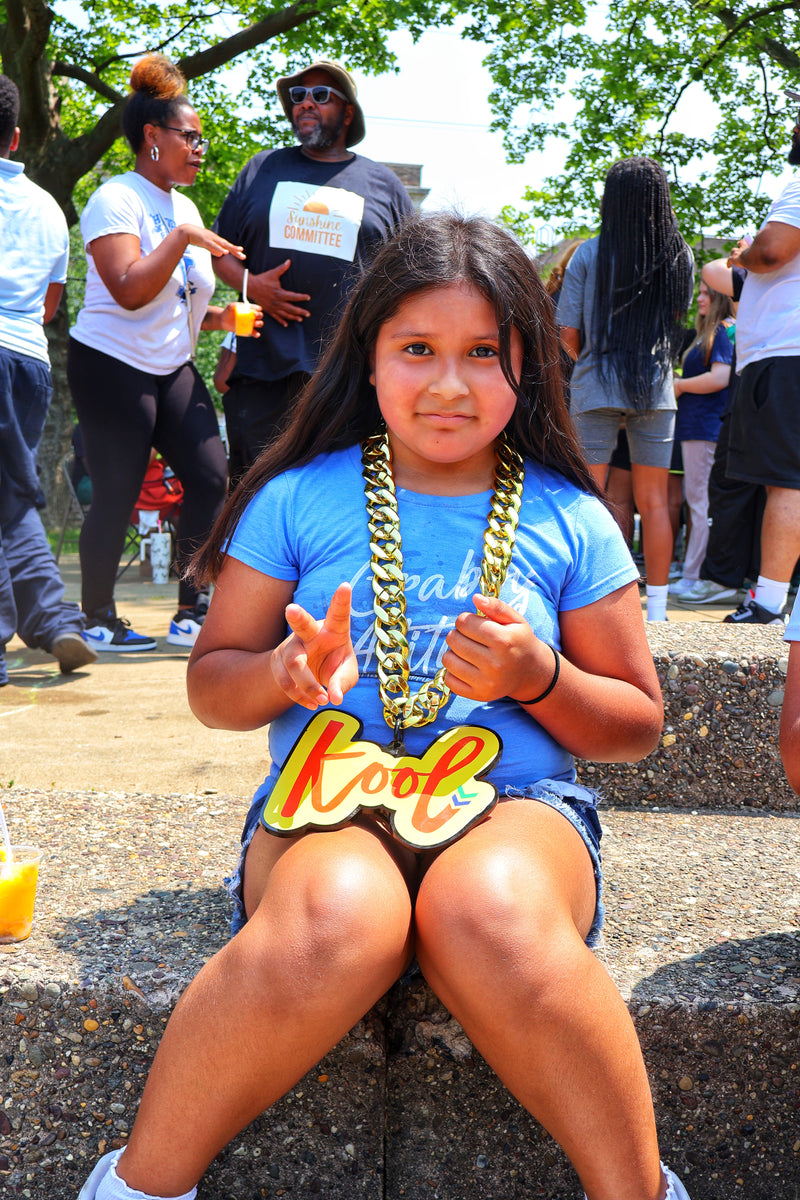 kool latin girl wearing kool chain