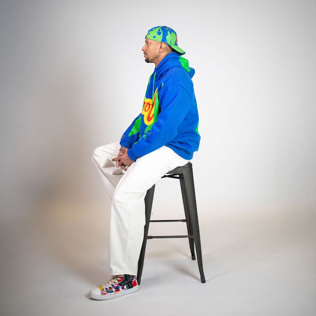 side view of kool world hoodie on creator randall law