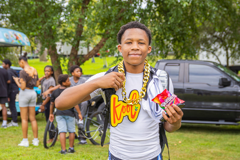 black teen wears kool chain 