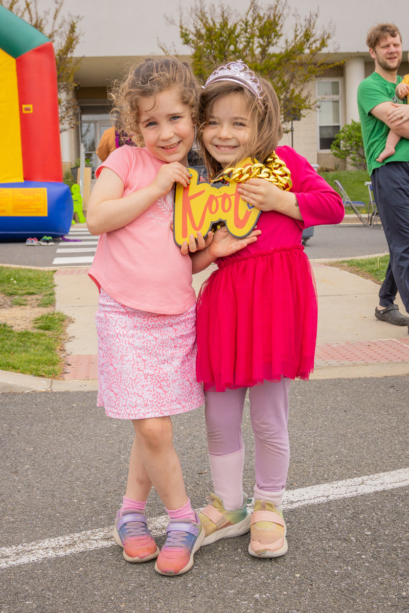 two girls hold kool chain at brandywine ymca in wilmington delaware